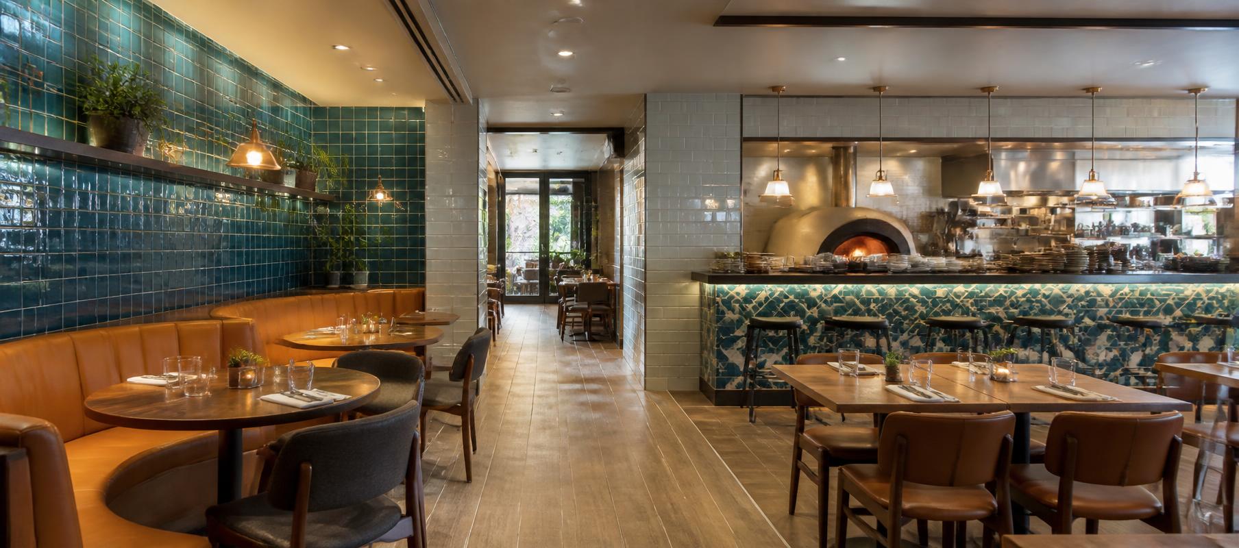 Restaurant interior featuring decorative tile surfaces