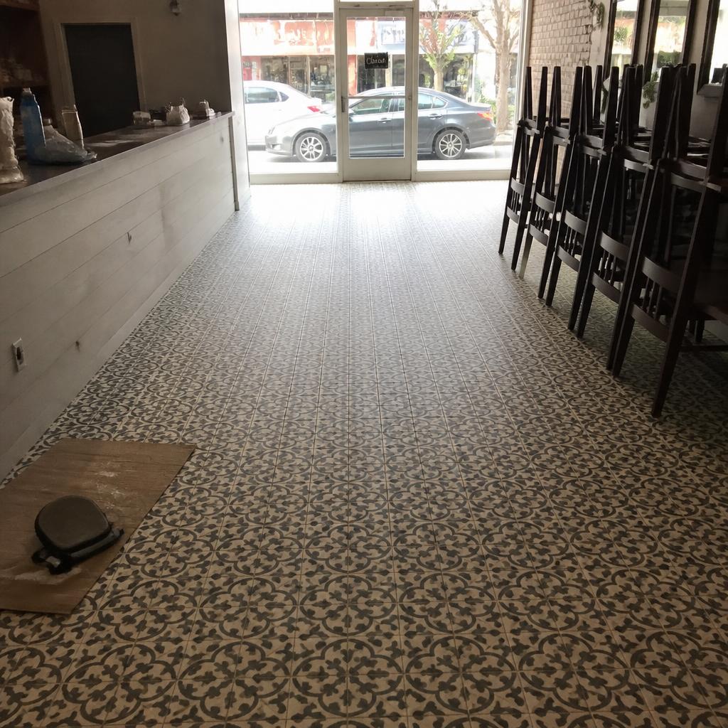 Restaurant dining room with patterned encaustic tile flooring
